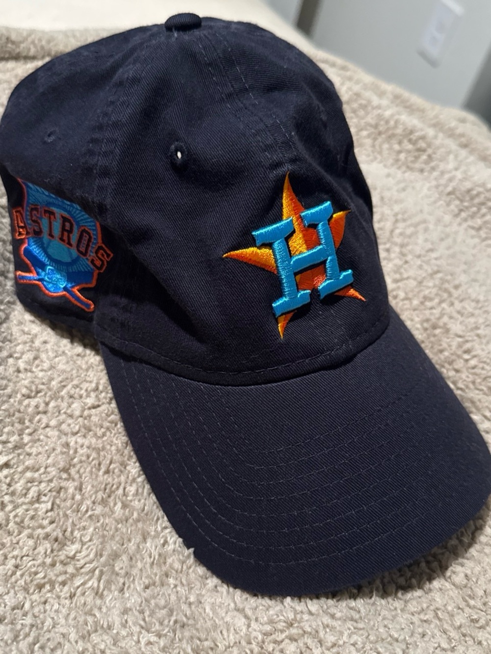New Era Black Cap with Blue & Orange Embroidered Logo